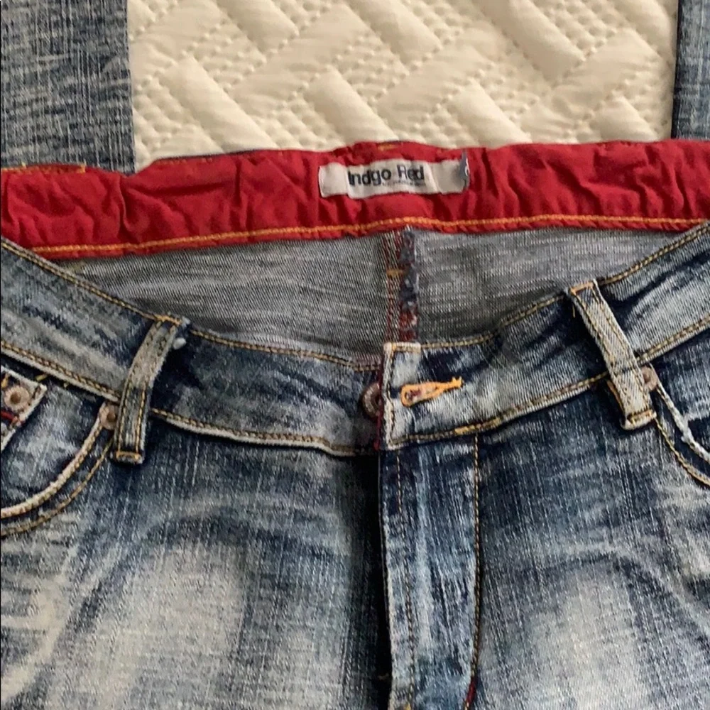 Indigo red washed‎ faded bootcut jeans